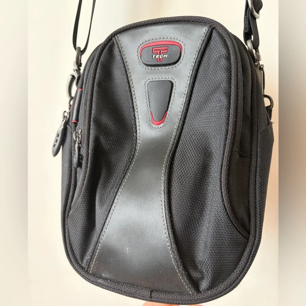 Tumi T-Tech sling bag with multiple compartments and Keychain mens